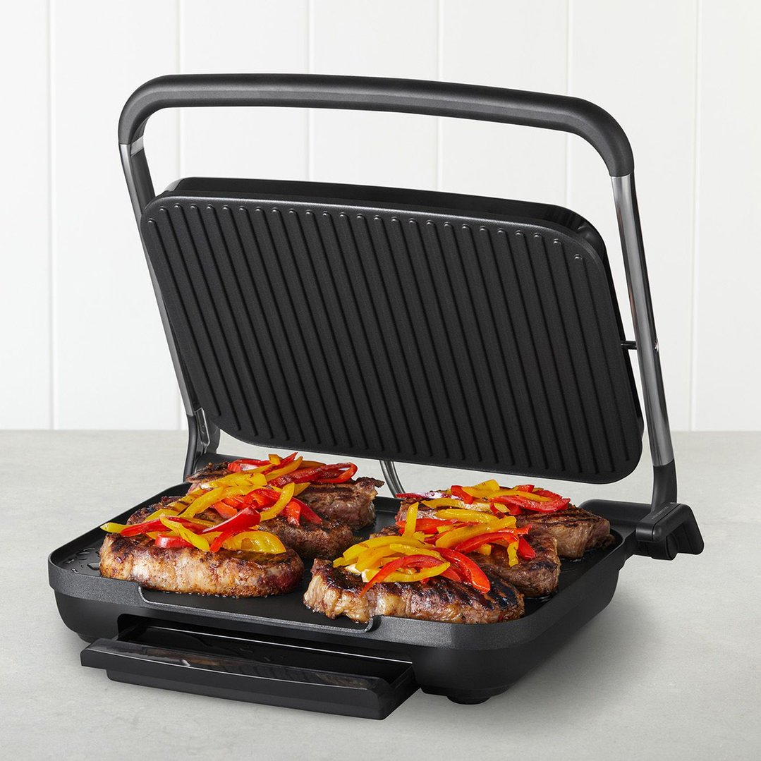 Café Style 6-Slice Sandwich Press & Maker grilling steaks with peppers on a counter