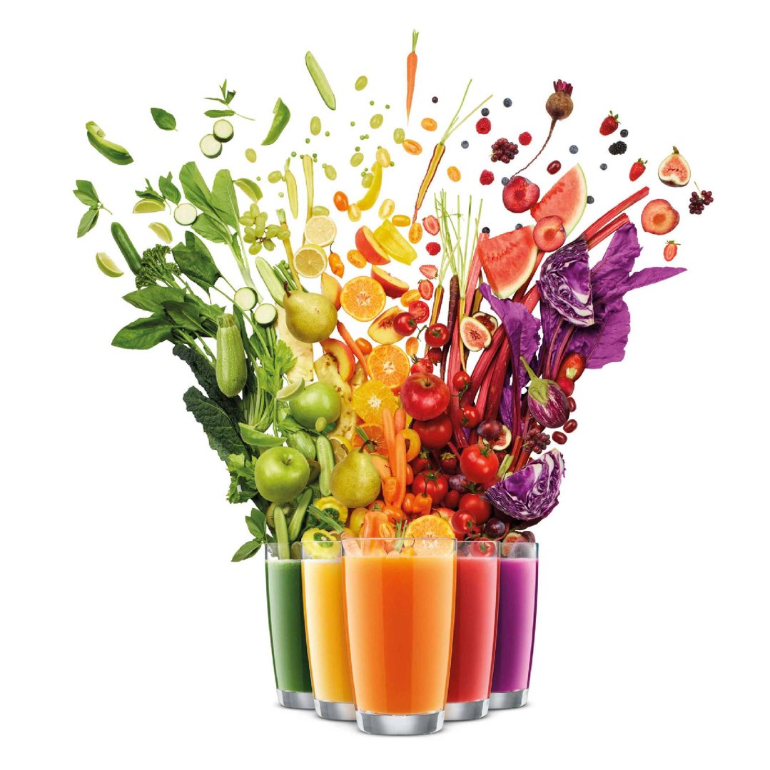 Rainbow of fruits and vegetables above five glasses of juice