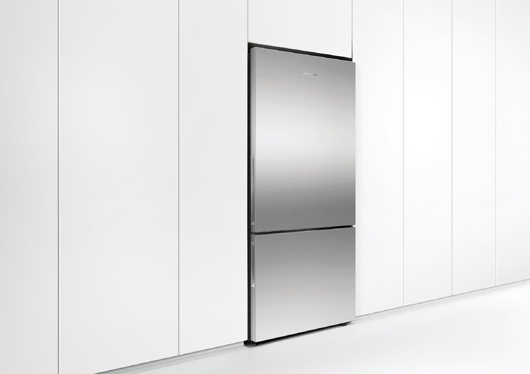A stainless steel Fisher & Paykel Refrigerator Freezer in a white kitchen