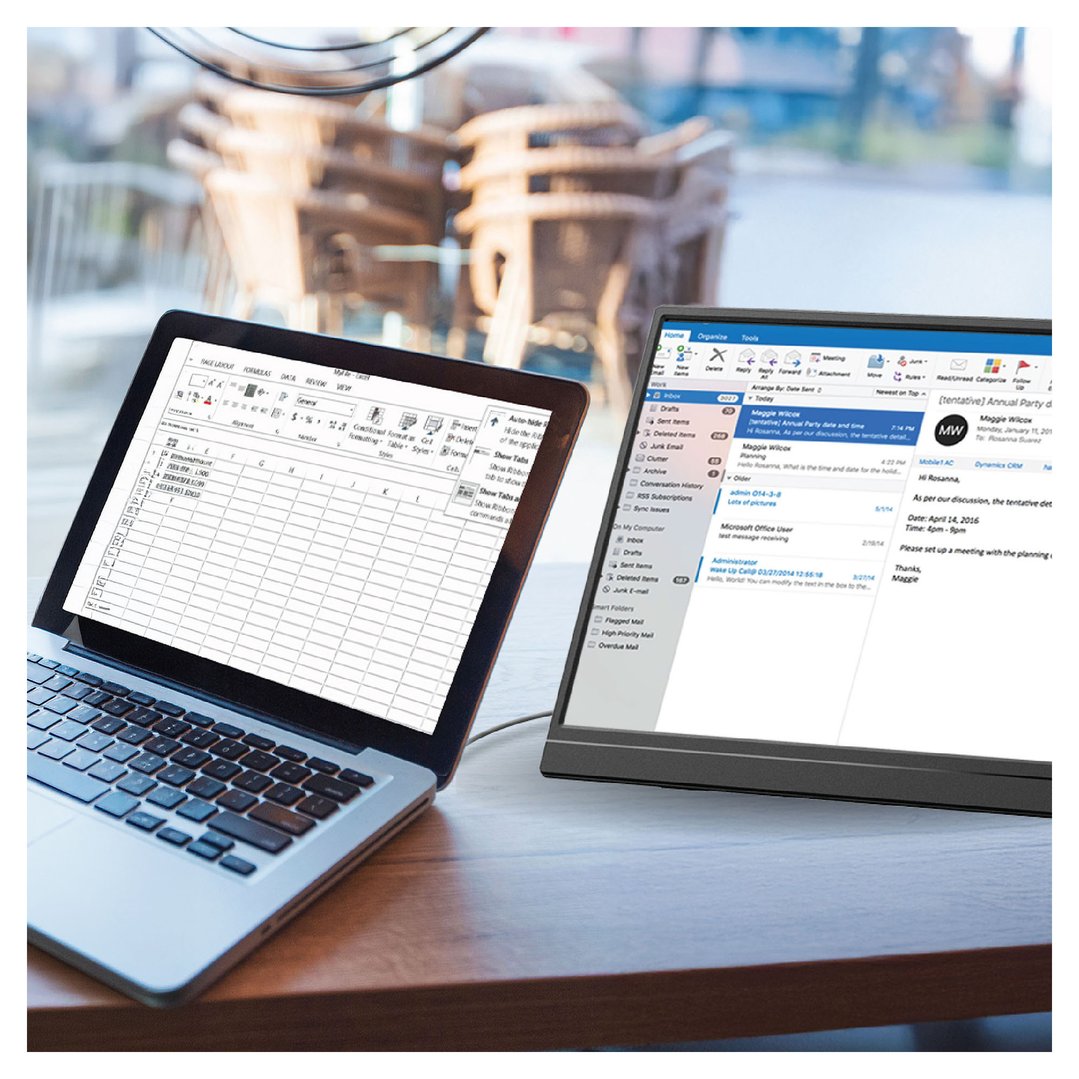LASER 15.6” Portable Monitor connected to a laptop on a wooden table