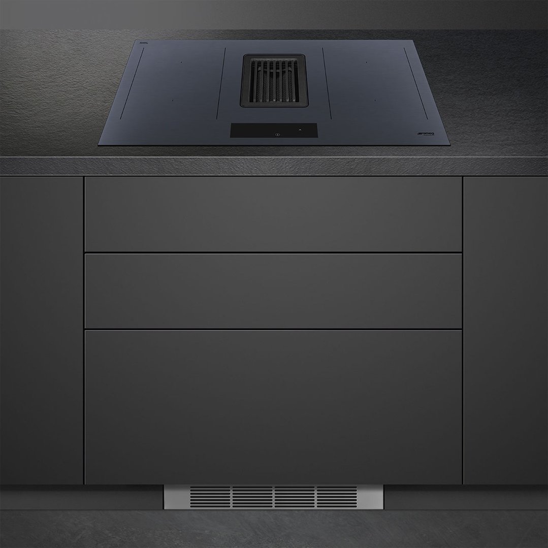 Integrated induction cooktop with AutoVent 2.0 in a modern kitchen setting