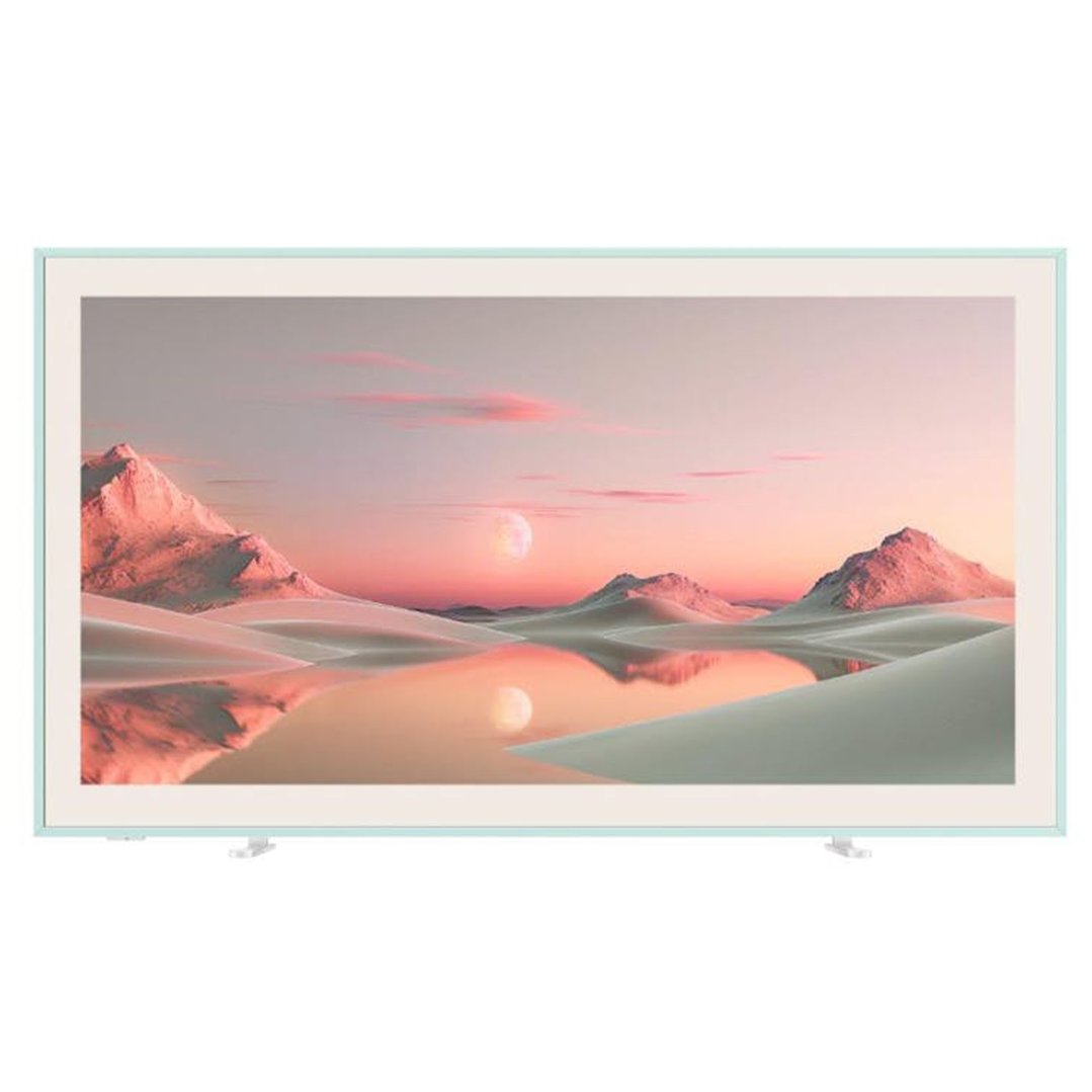 A mint green framed TV displaying a desert landscape with a pink sky and moon