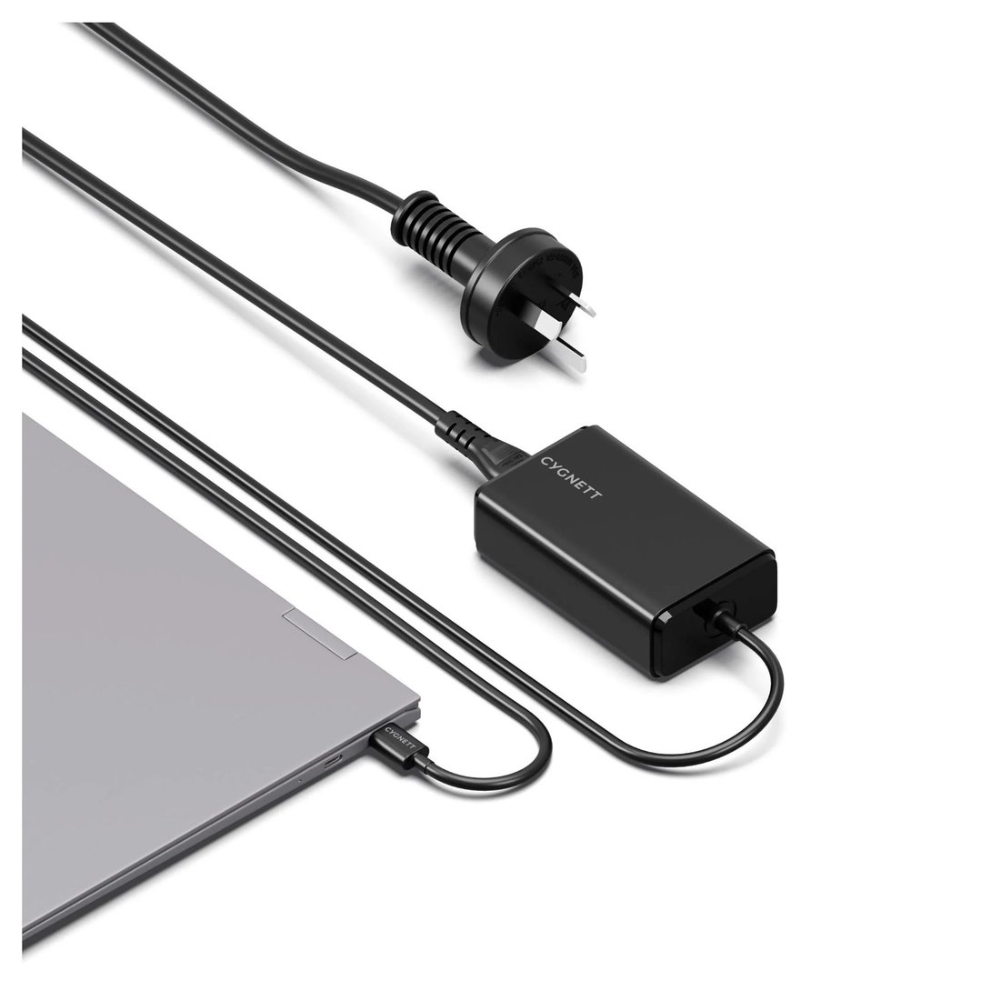 Black CYGNETT charger connected to a laptop and a power plug