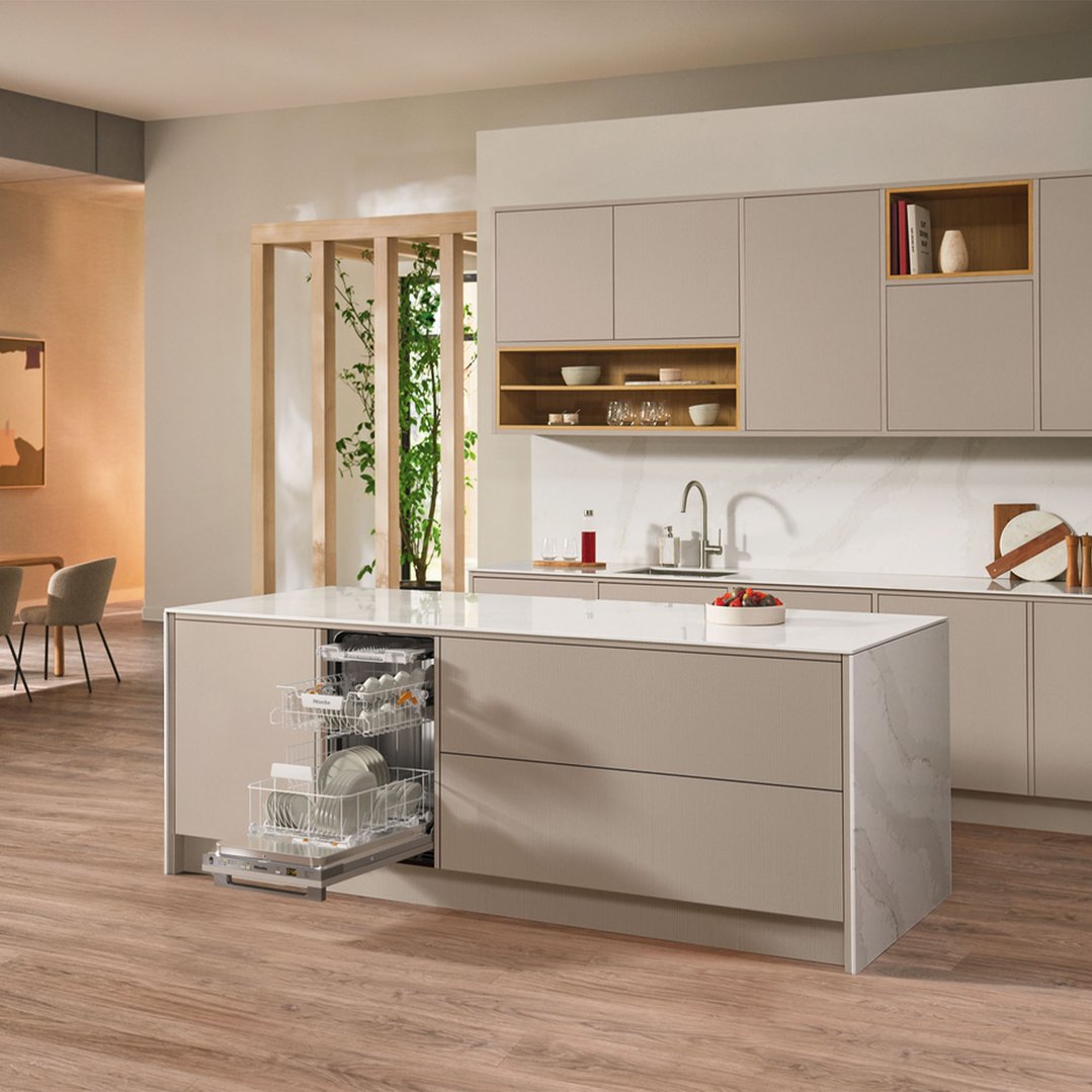 Fully integrated dishwasher with QuickPowerWash in a modern kitchen island setting