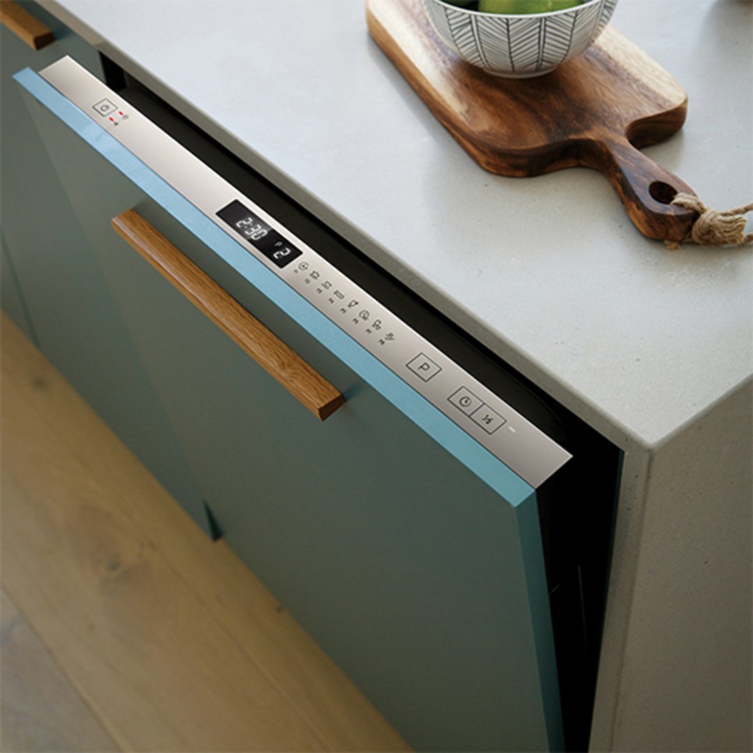 Integrated dishwasher with control panel visible in a modern kitchen setting