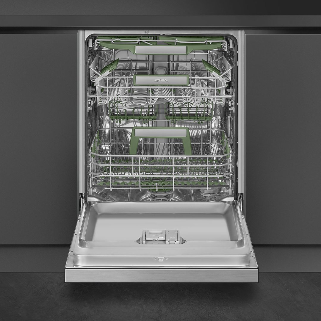 Open dishwasher with green racks in a dark grey kitchen setting
