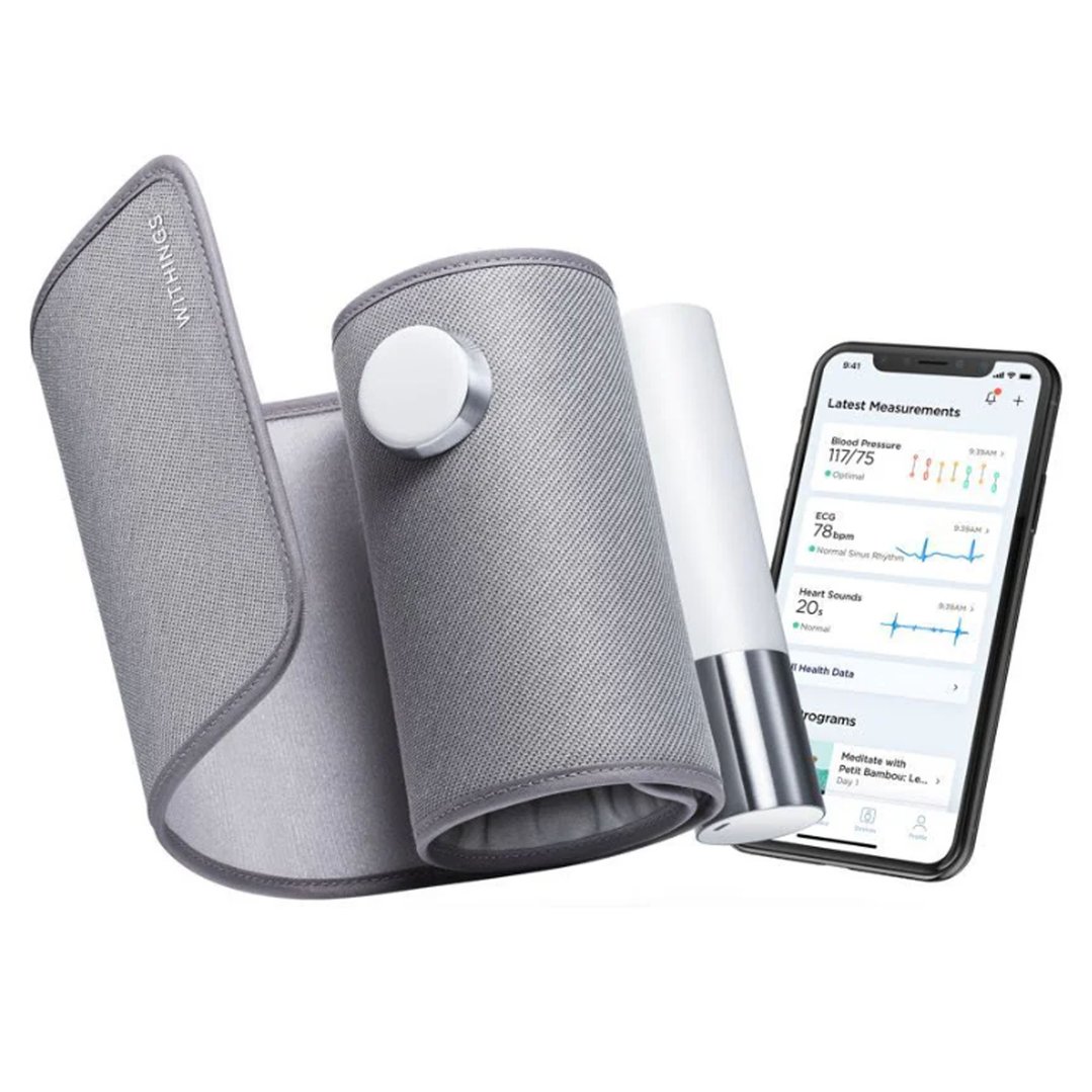 Withings BPM Core Wireless Blood Pressure Monitor with a smartphone displaying health data