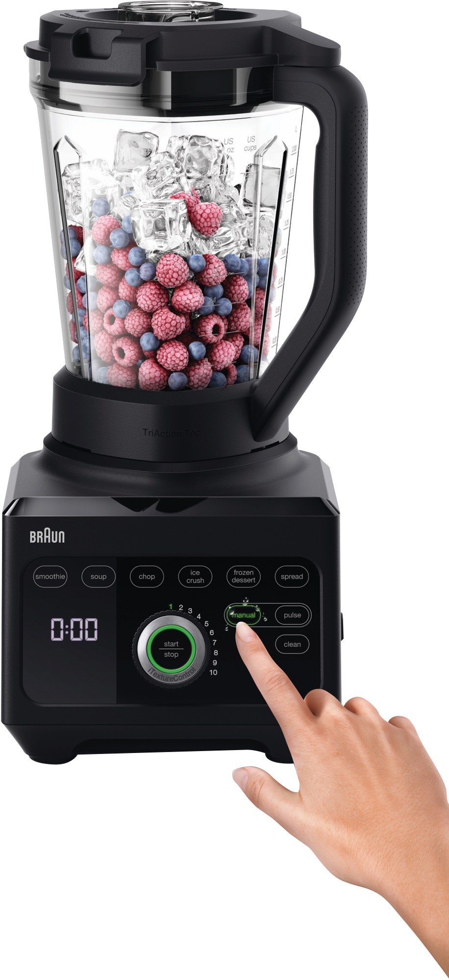 Hand pressing the manual button on a Braun PowerBlend 9 Jug Blender