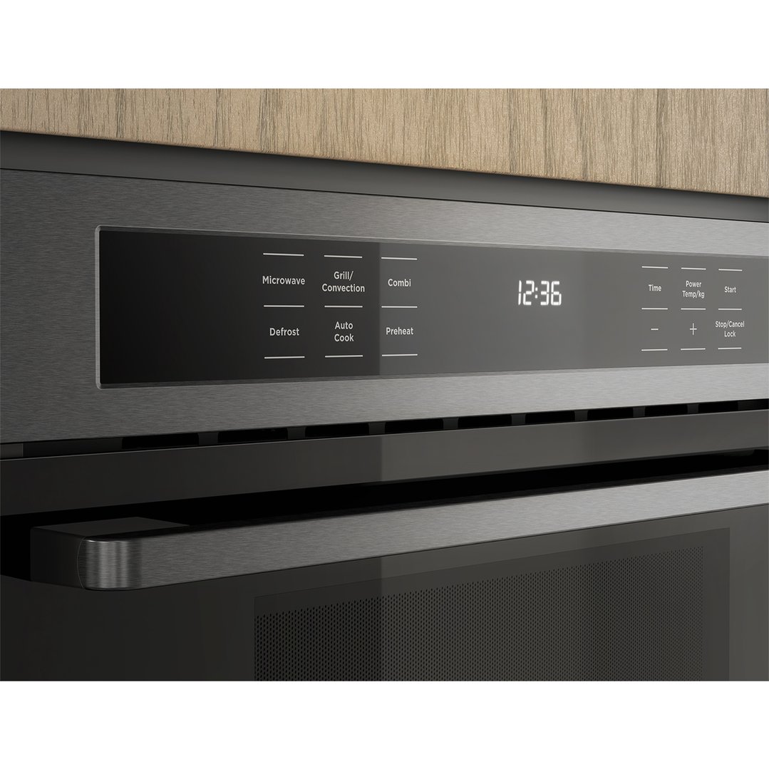 Built-in combination microwave with a digital display showing 12:36 and control buttons