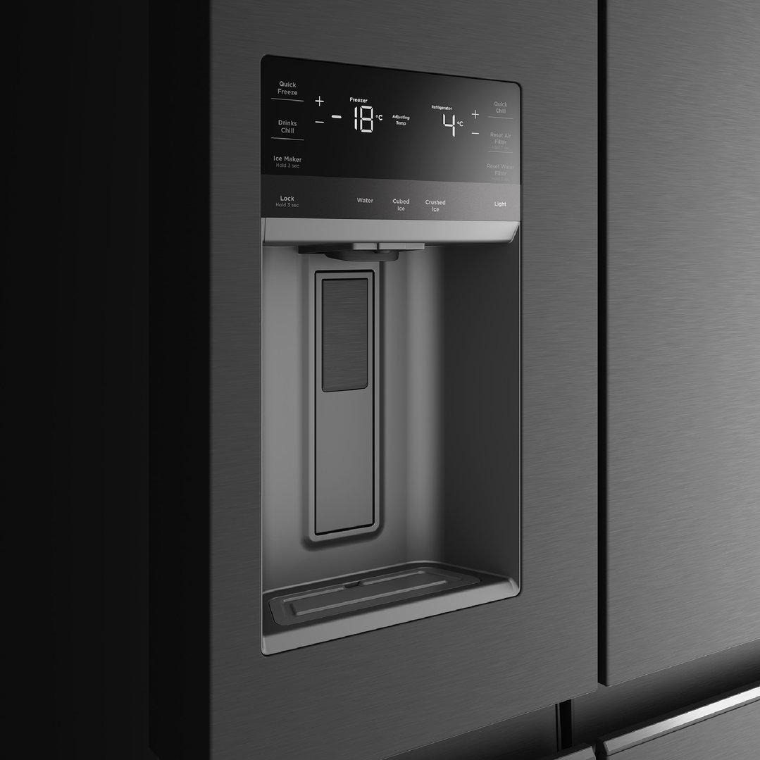 Close-up of a matte black quad door fridge's control panel and water dispenser