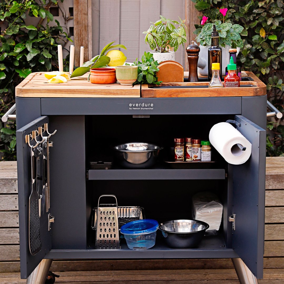 Mobile Preparation Kitchen with ingredients and utensils on a wooden deck