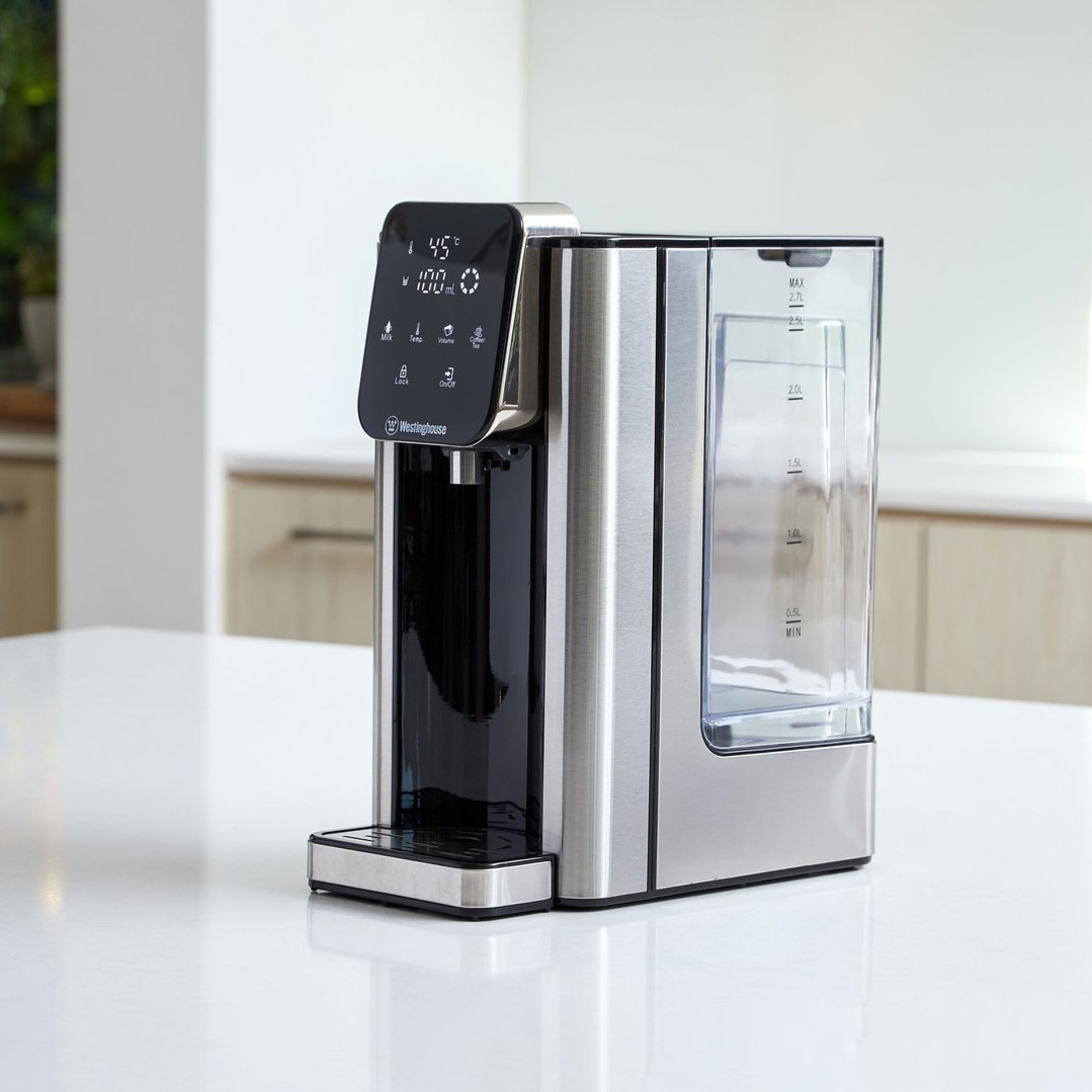 Instant Hot Water Dispenser on a white countertop in a kitchen setting