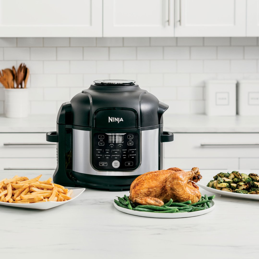 Ninja Foodi 11-in-1 6L Multi Cooker with cooked food on a kitchen counter