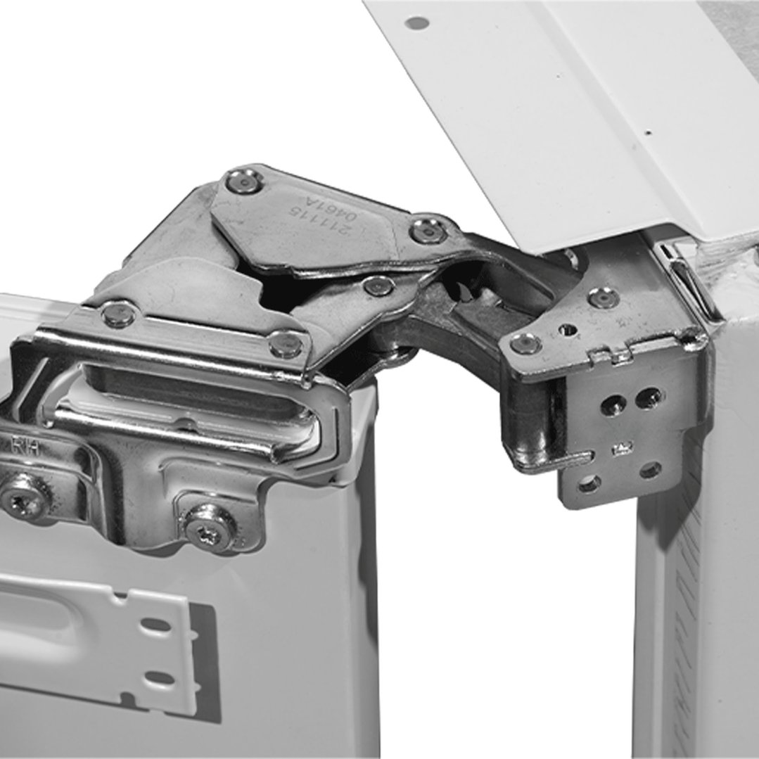 Close-up of the hinge mechanism on an integrated bar fridge door