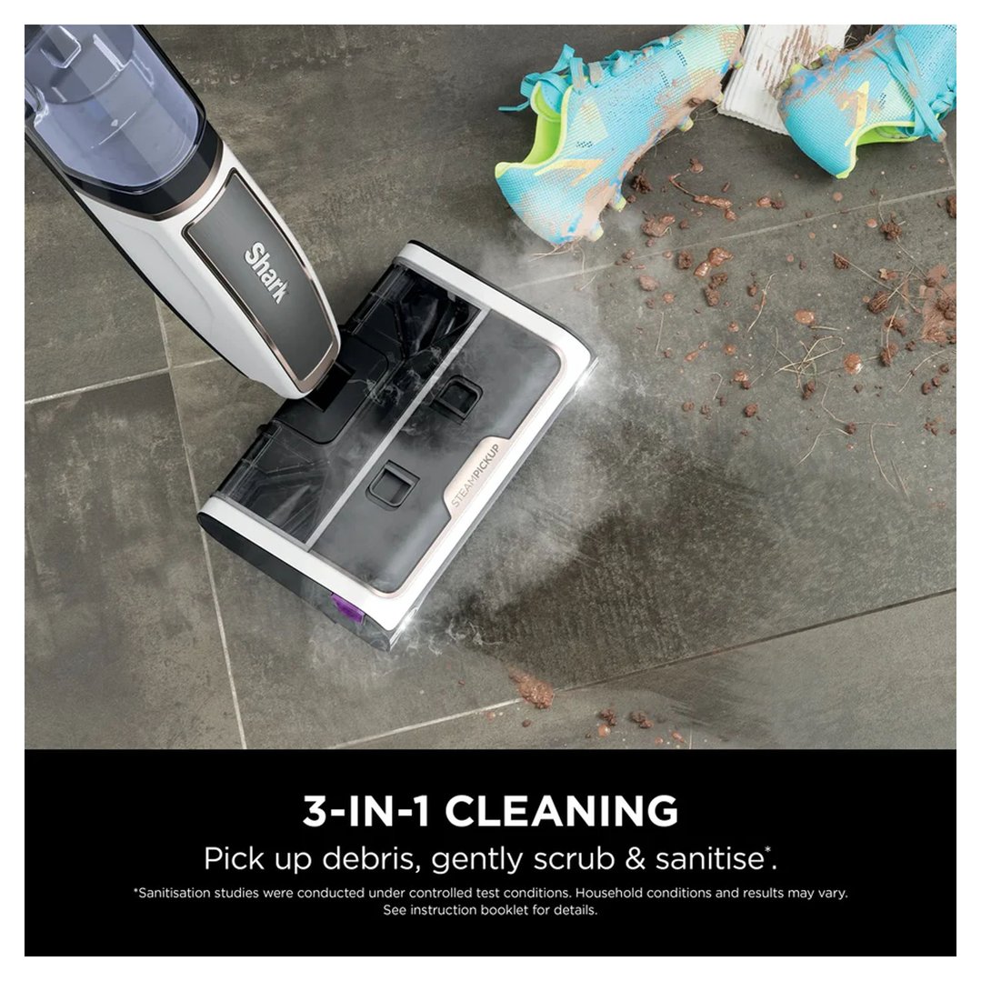 Steam Pickup 3-in-1 Steam Mop cleaning a dirty floor with muddy shoes nearby