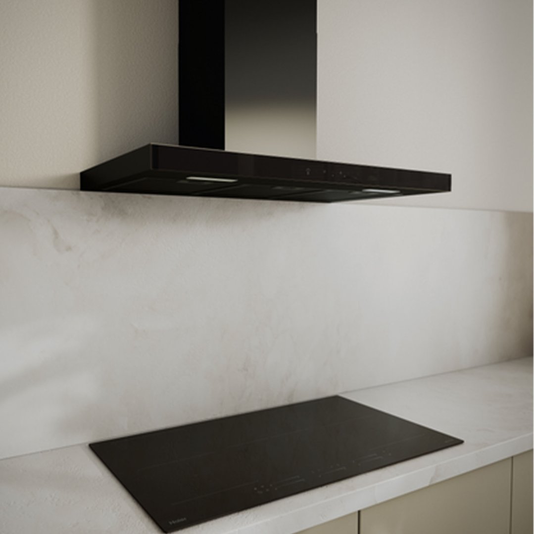 Black Haier rangehood and cooktop in a modern kitchen setting