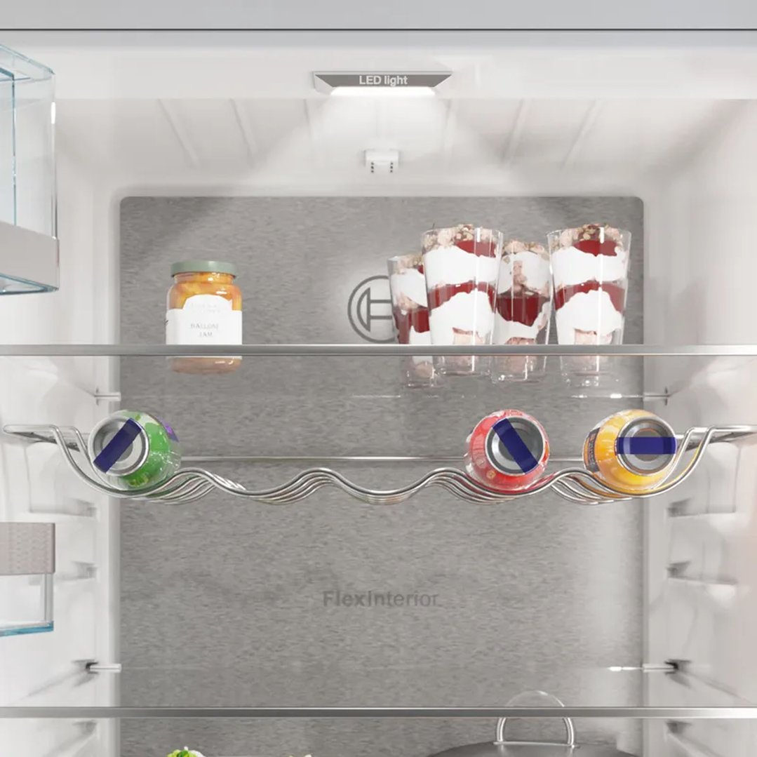 Interior view of a Bosch fridge with food items on shelves
