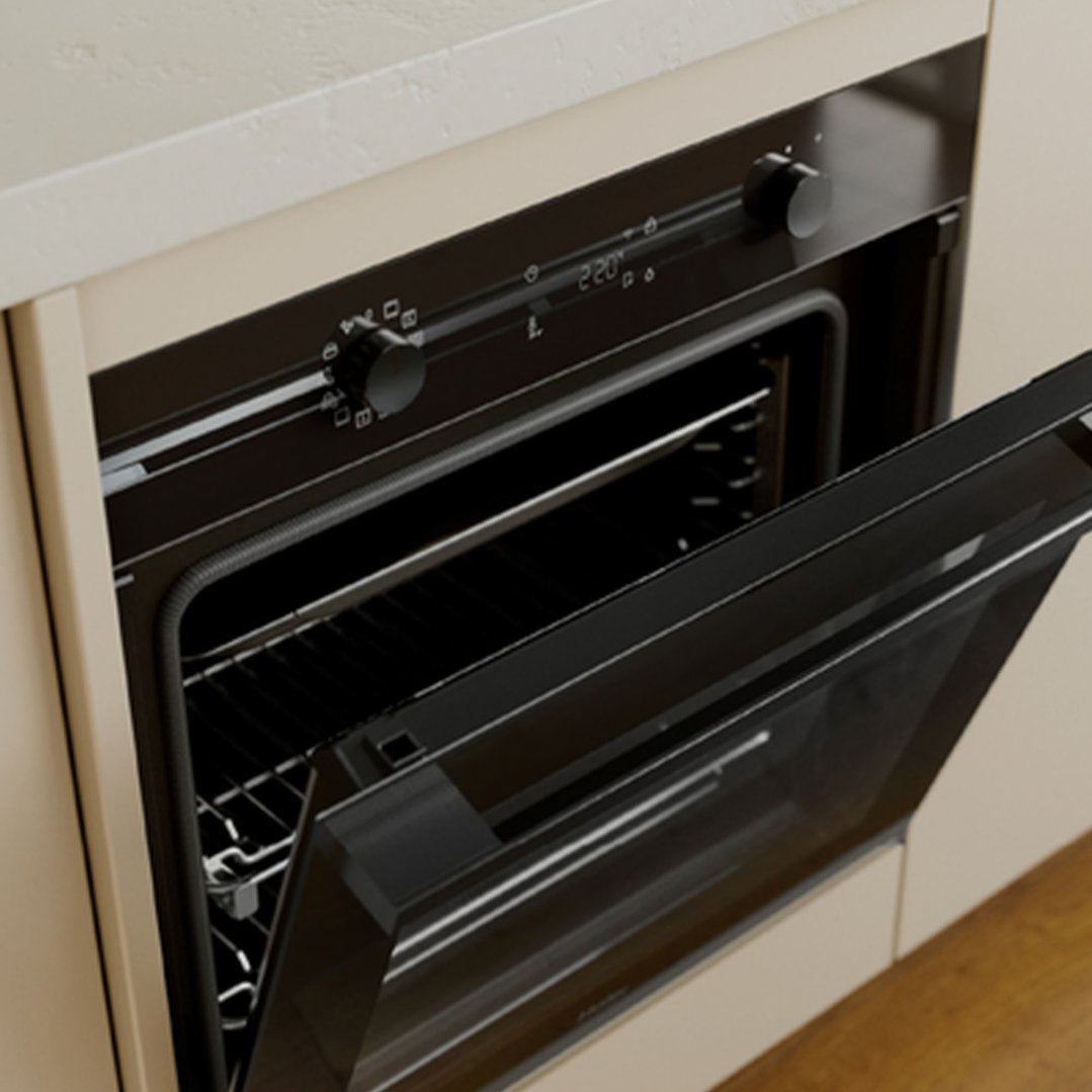 Built-in oven with the door partially open in a kitchen setting