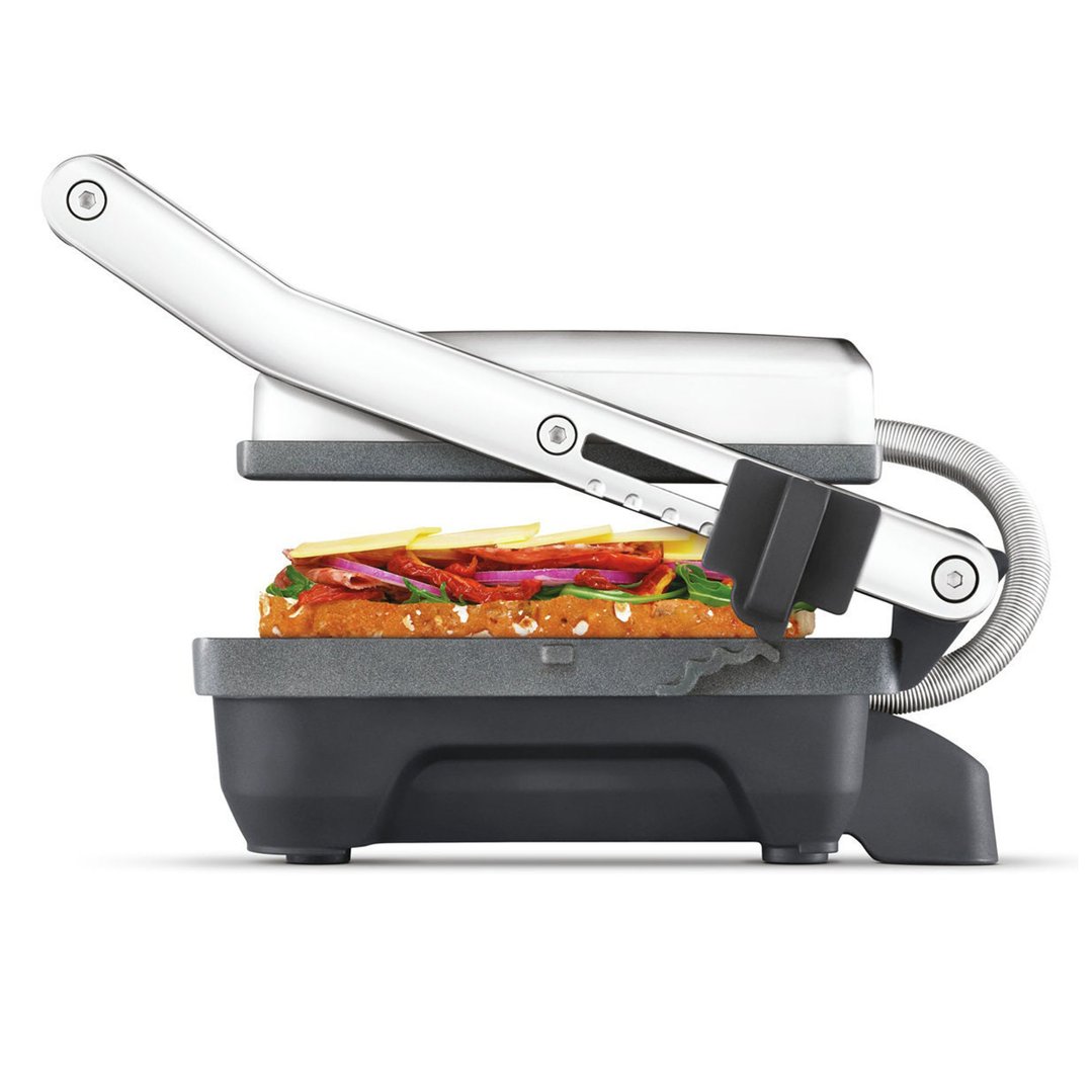 Breville Toast & Melt sandwich maker grill with a sandwich inside