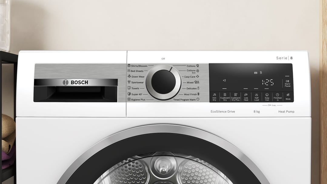 Close up of a Bosch heat pump dryer control panel and door