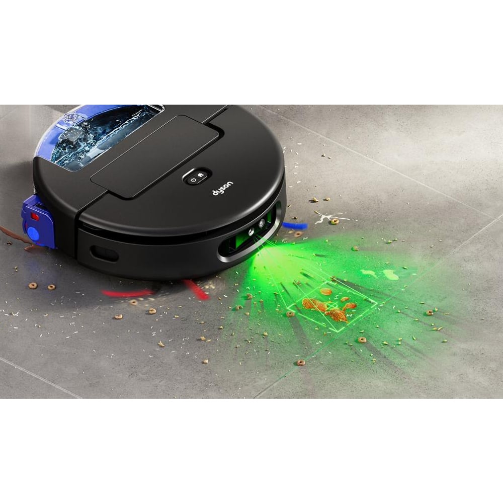 Dyson robot vacuum cleaner with green laser detecting debris on a tiled floor