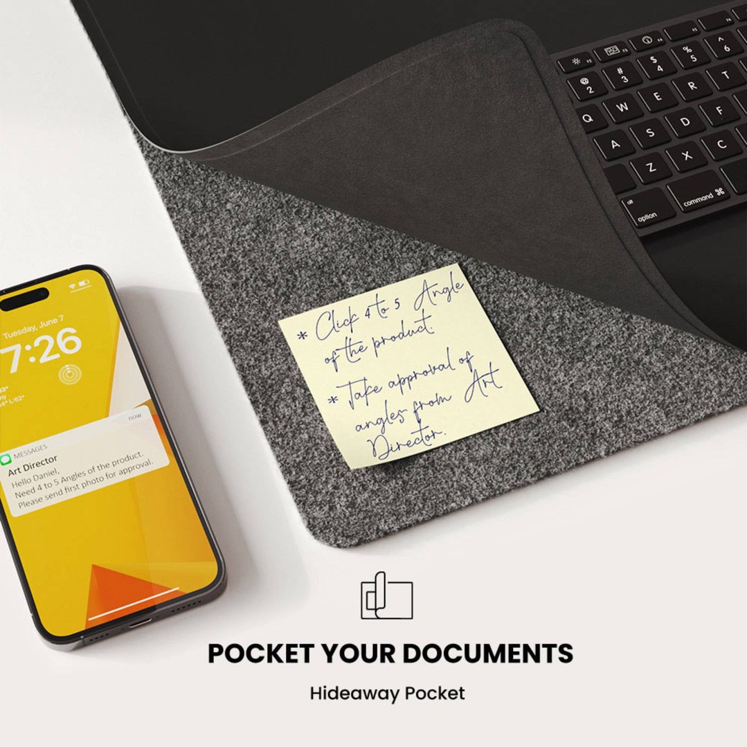 ALTI Wireless Charging Desk Mat with a phone and a sticky note on a desk