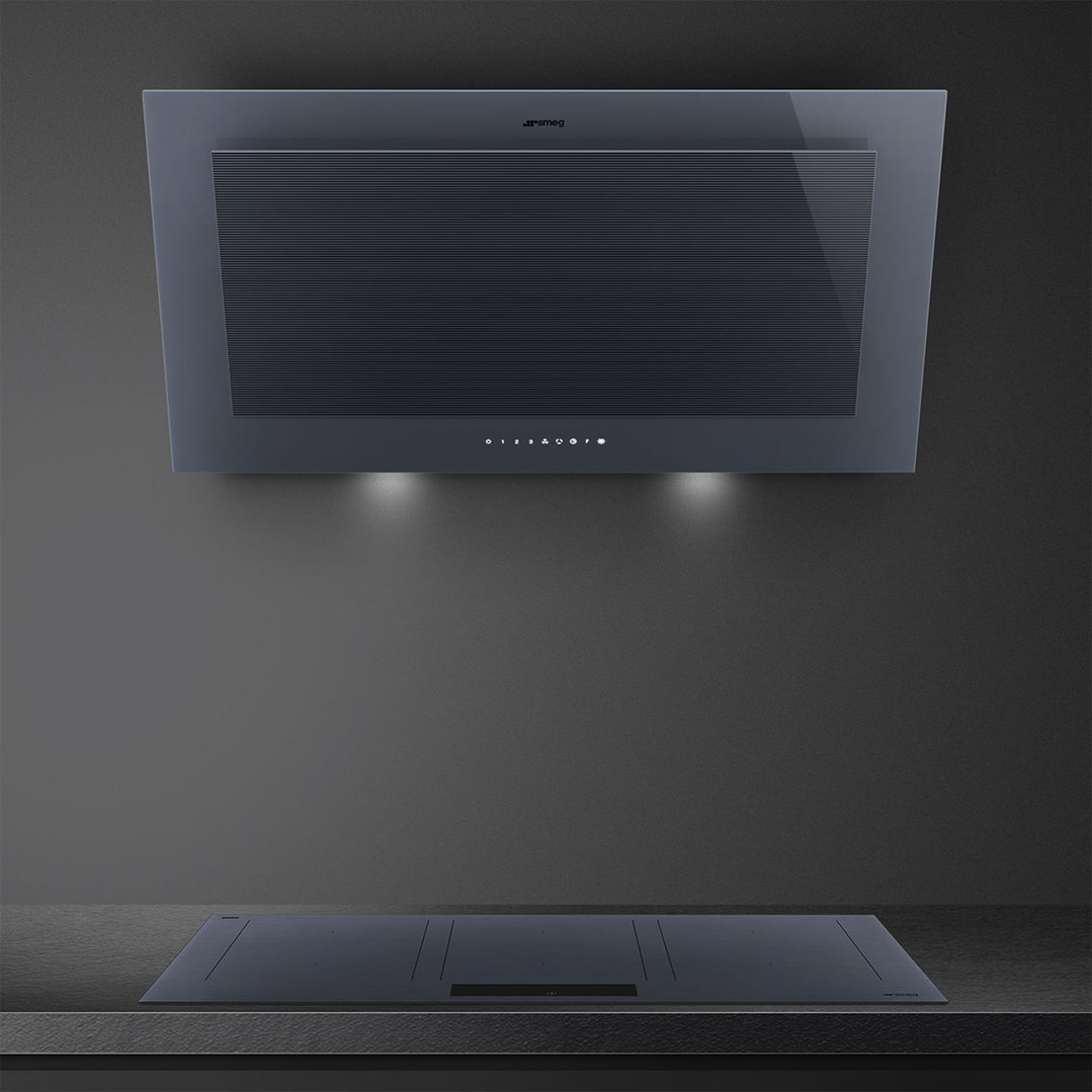 Dark grey cooktop and rangehood in a modern kitchen setting