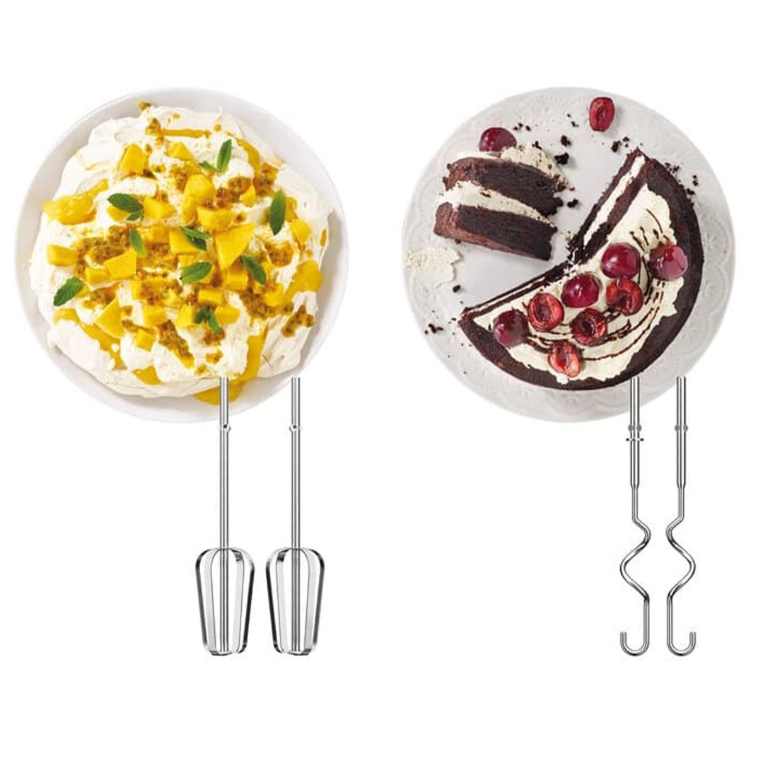 Two hand mixer attachments are shown with desserts, one with mango and one with cherries