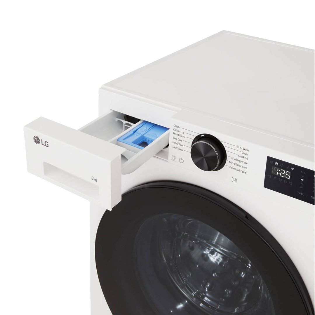 Close up of a white LG washing machine with the detergent drawer open