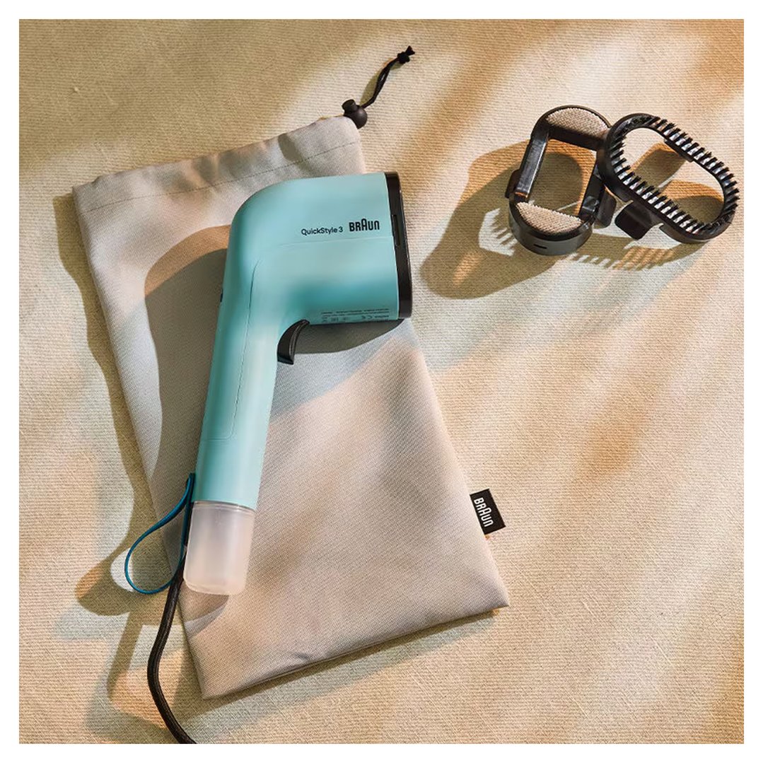 Braun QuickStyle 3 Garment Steamer and accessories on a textured surface