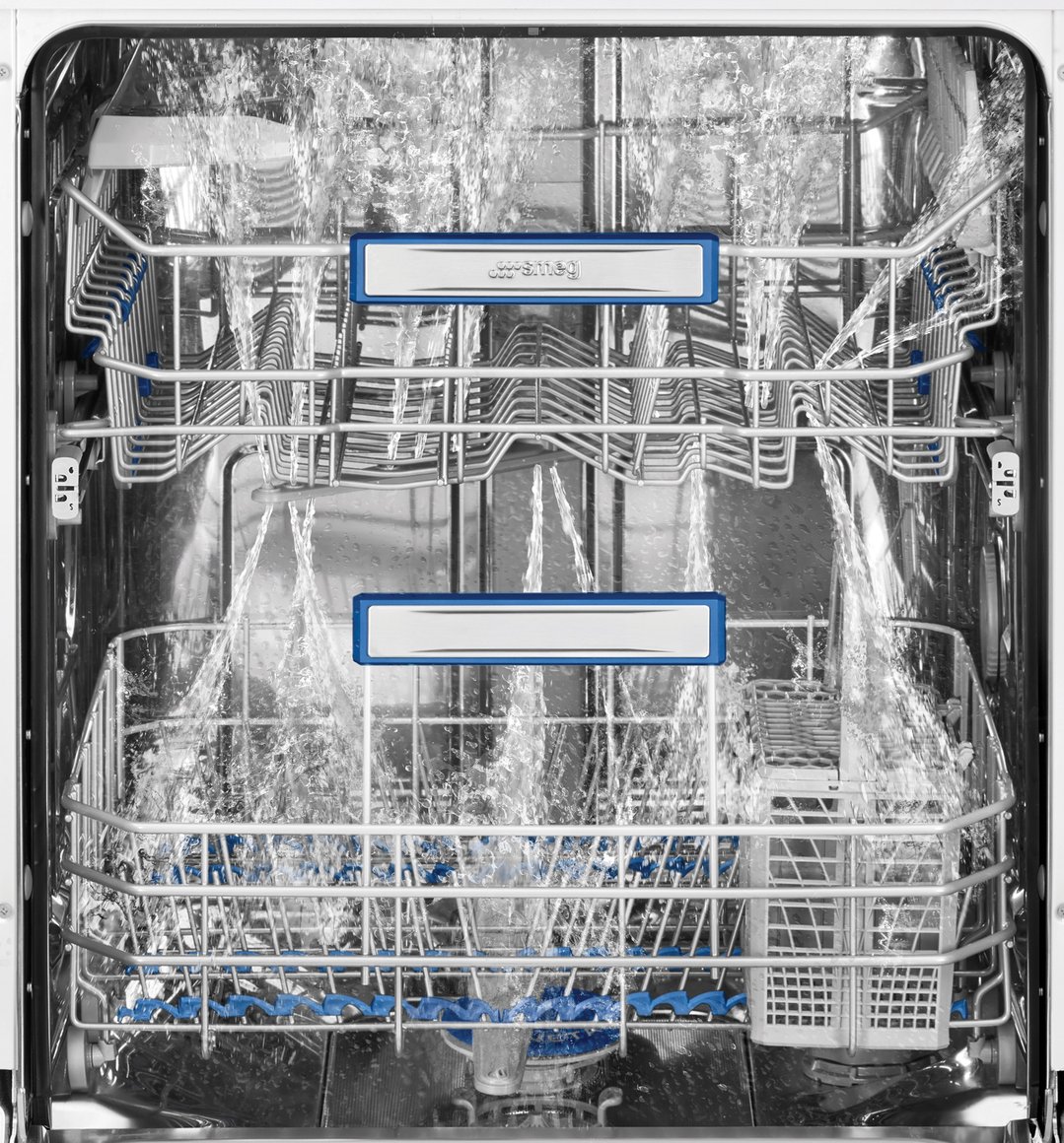 Inside a dishwasher with water spraying during a wash cycle