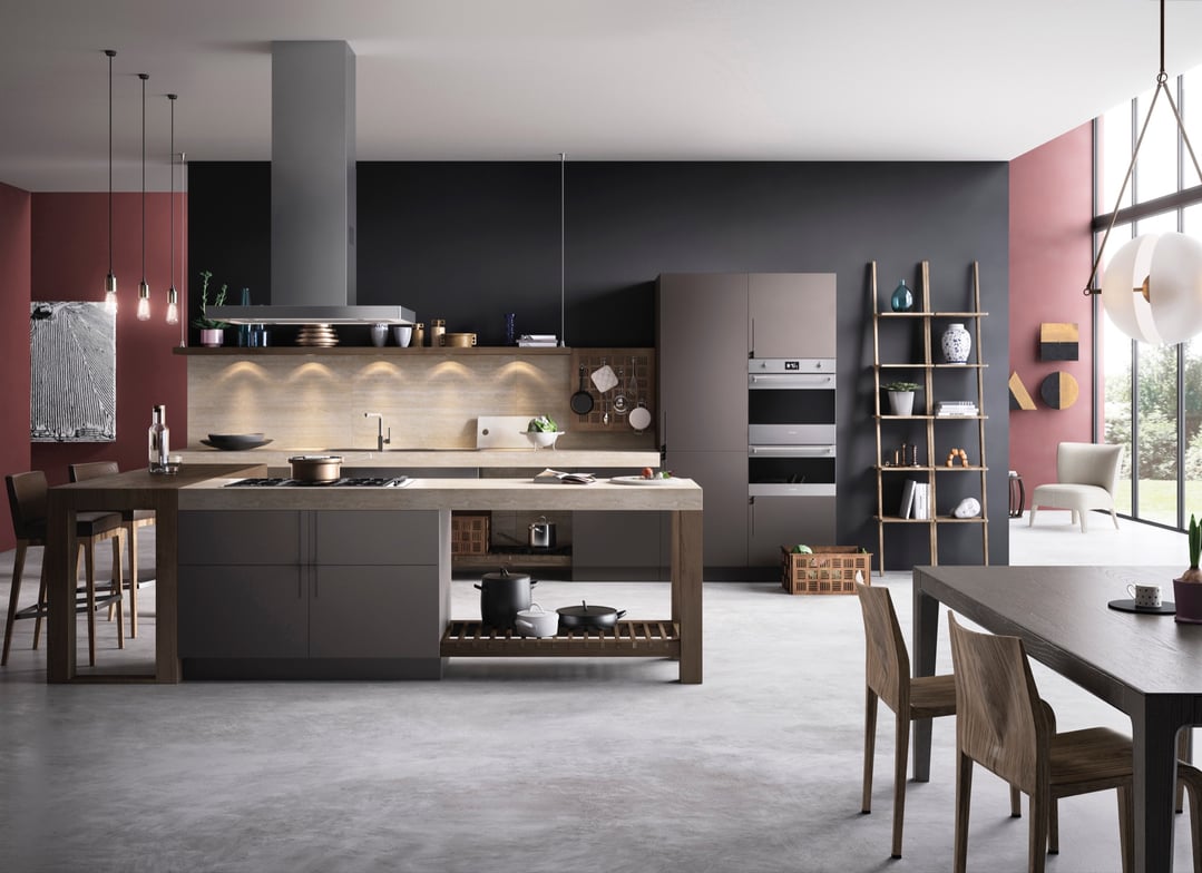 A modern kitchen with a built-in double oven, island, and dining area
