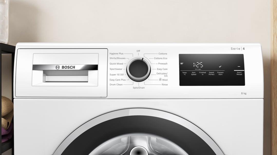Close-up of a white Bosch washing machine control panel and display