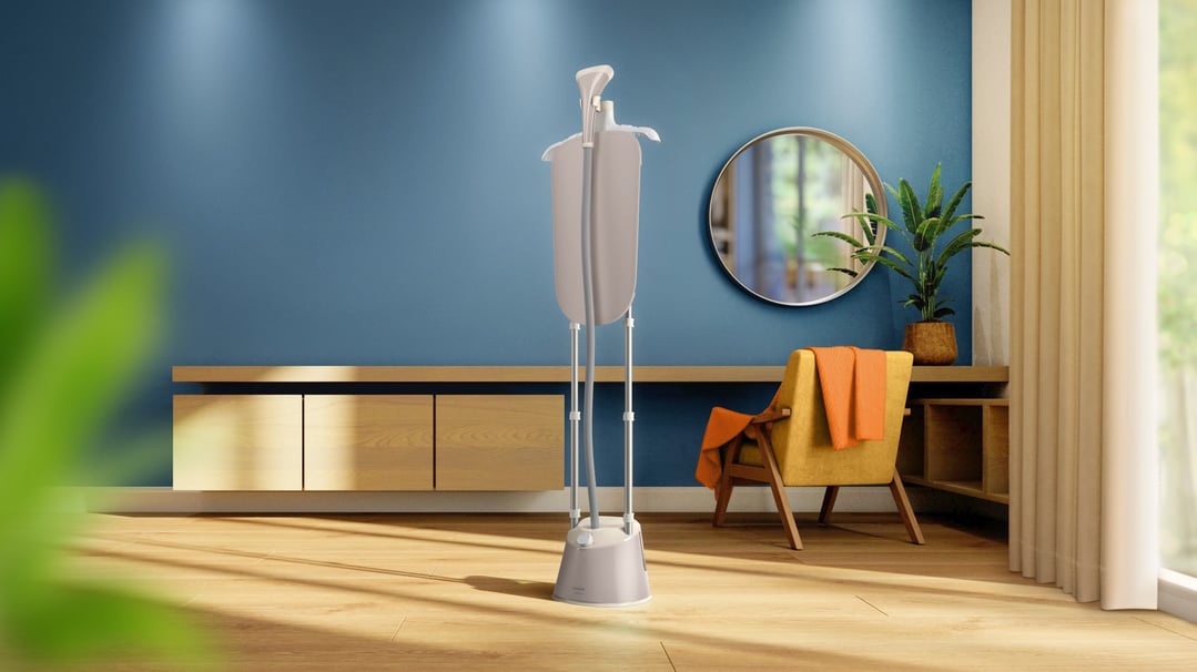 Garment steamer with board in a modern living room with blue wall