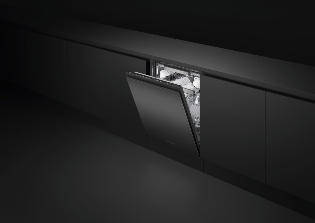 Black built-under dishwasher with door ajar, showing dishes inside
