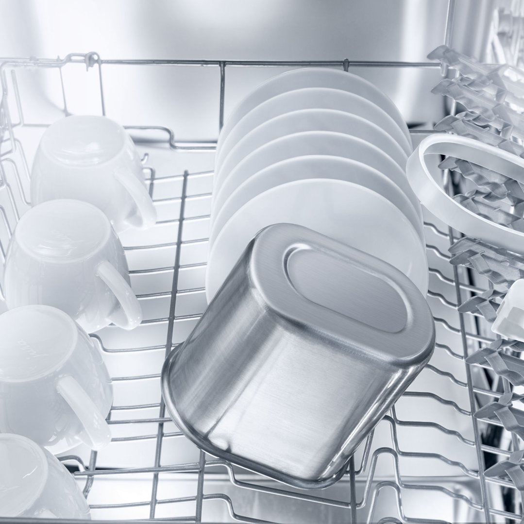 Close up of a JURA Cool Control 1L White in a dishwasher