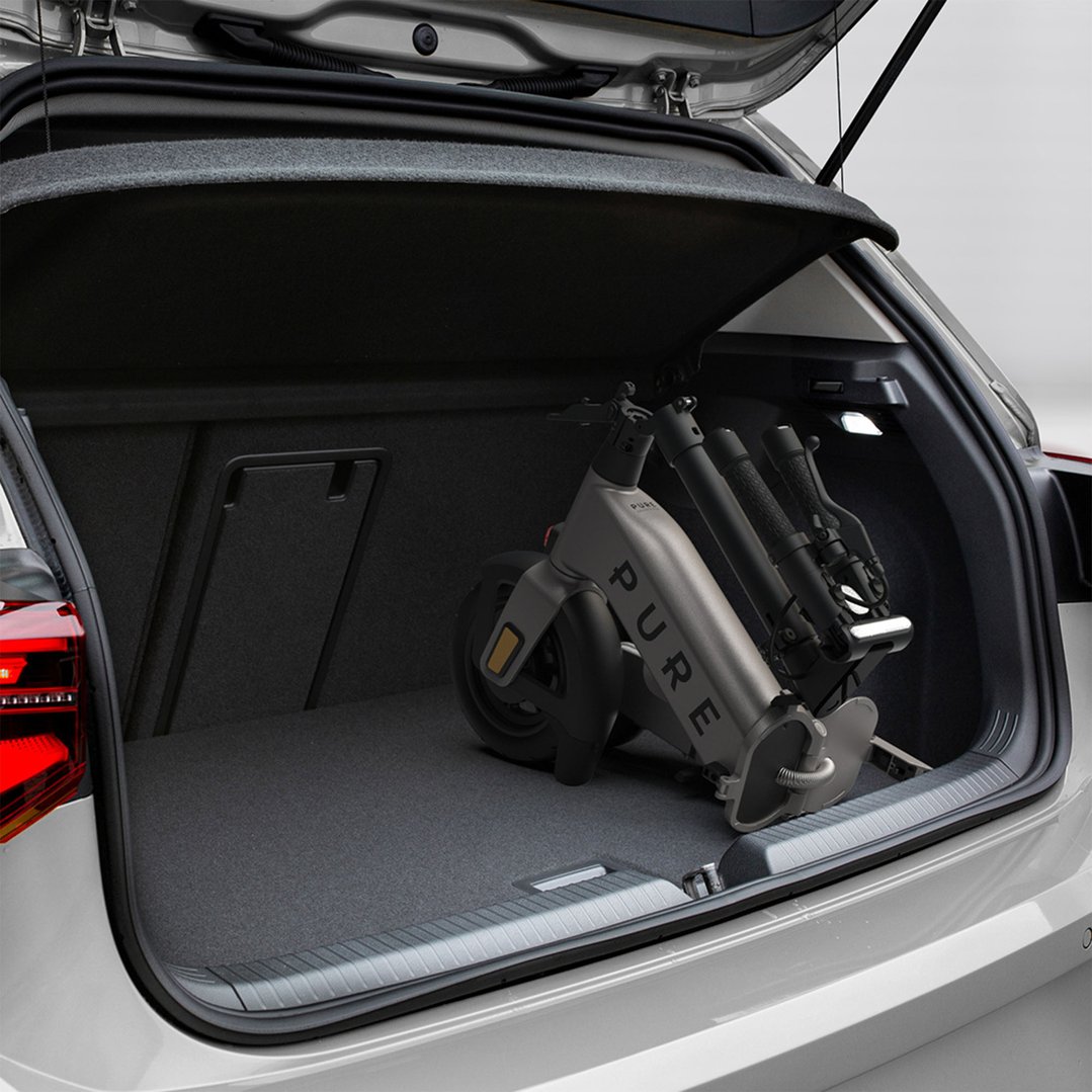 Advance Flex Electric Scooter folded in the boot of a car