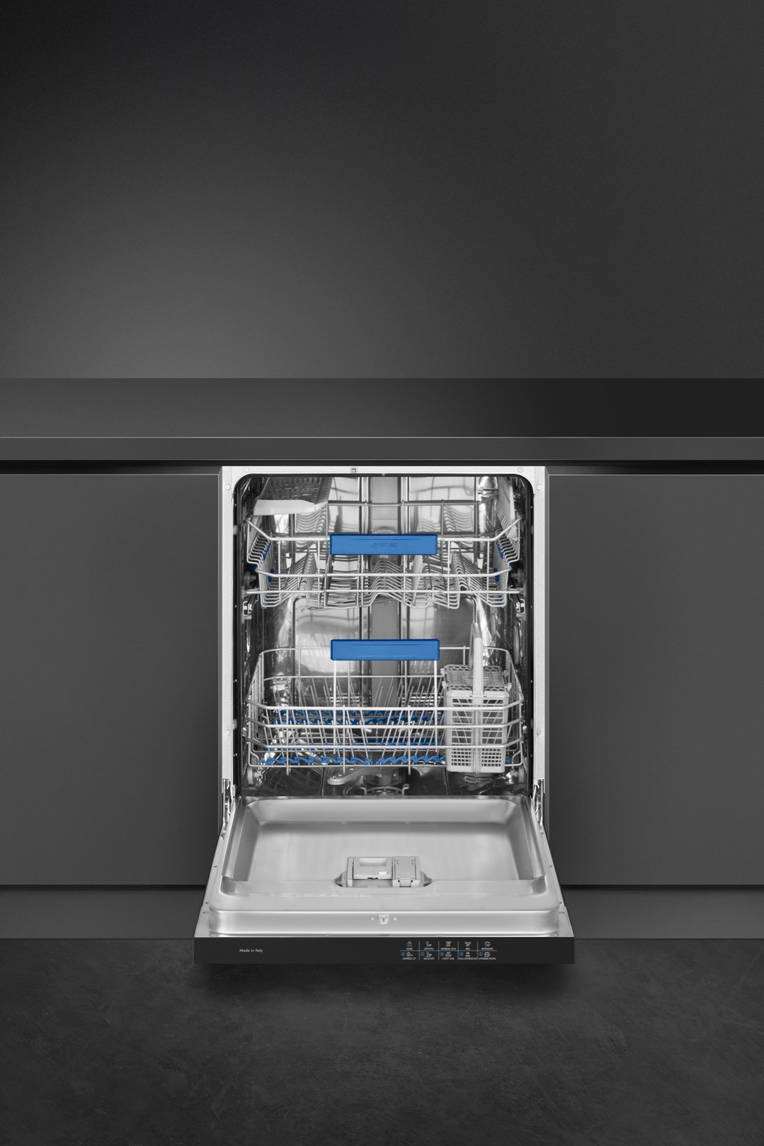 Open matte black dishwasher with racks visible in a dark kitchen setting