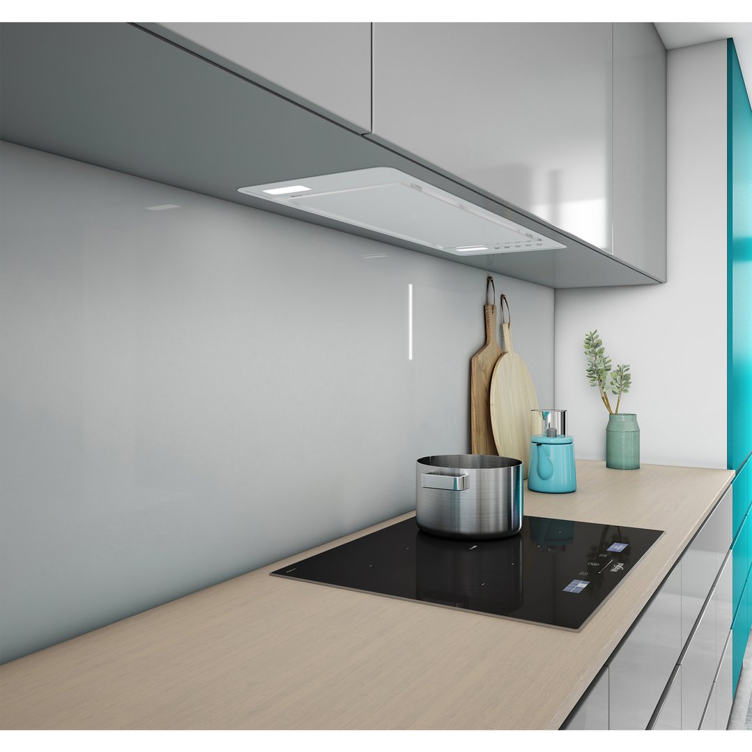 Undermount rangehood installed above an induction cooktop in a modern kitchen
