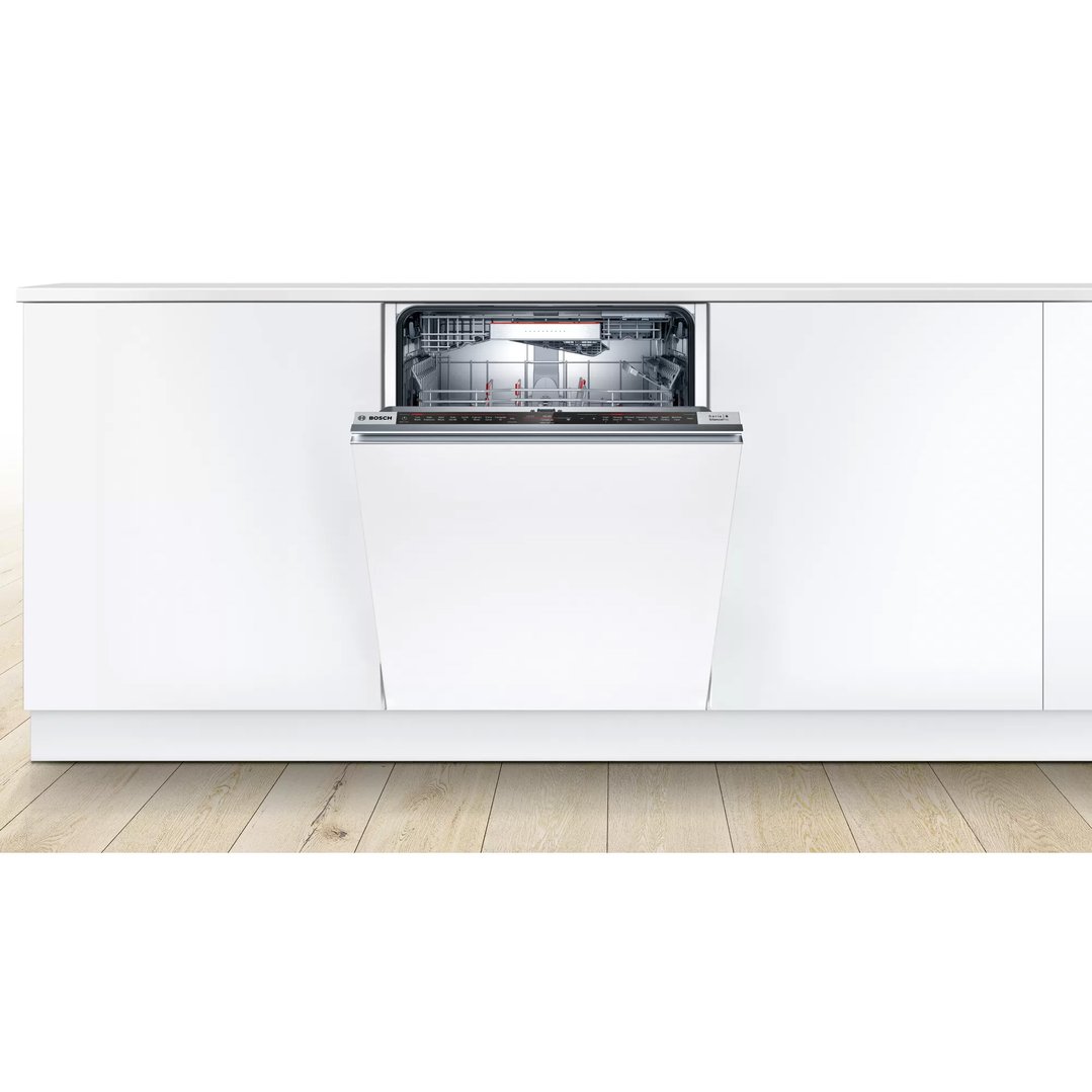 Fully-integrated Bosch dishwasher with the door partially open in a white kitchen
