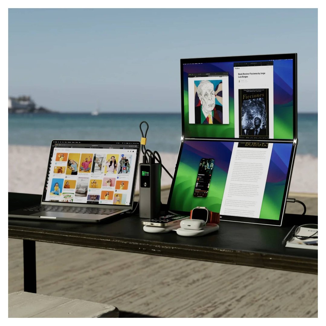 ALOGIC Ark Pro power bank charging devices on a table at the beach
