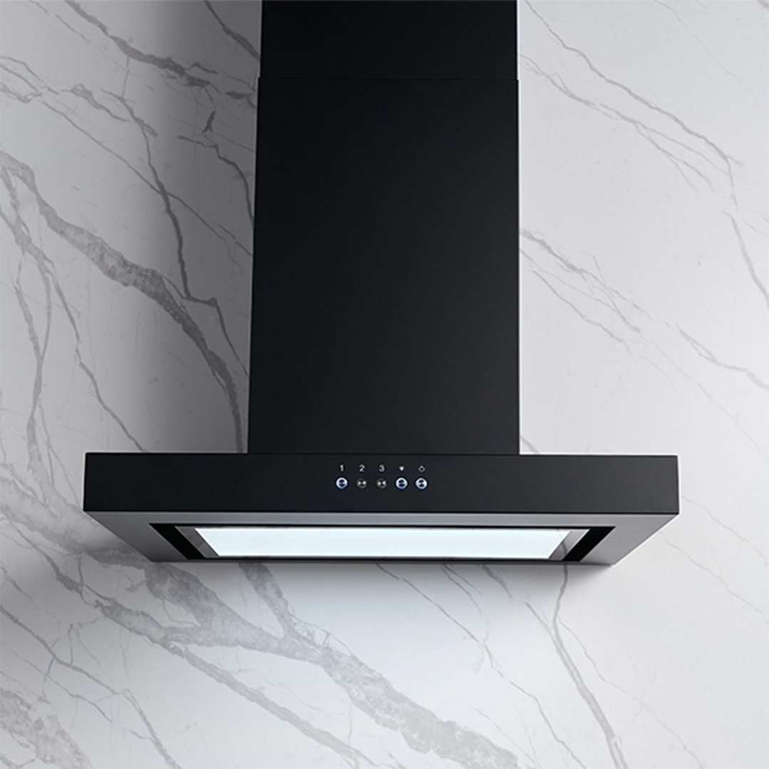 Black canopy rangehood with illuminated controls and light, mounted on a marble wall