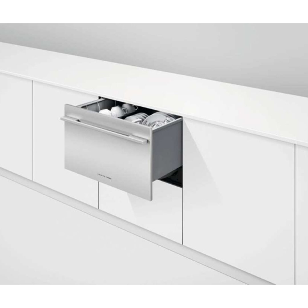 Single DishDrawer Dishwasher integrated into white kitchen cabinetry, partially open