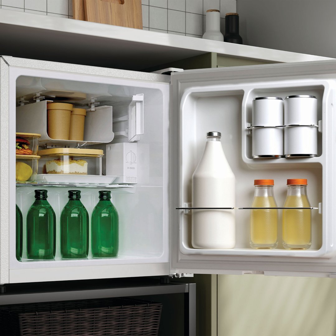 Open Haier 42L 300 Series Bar Refrigerator with drinks and food inside