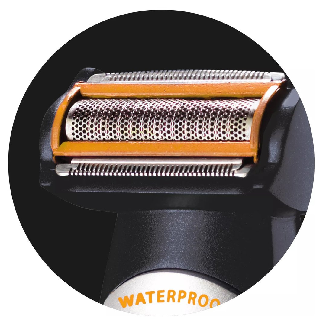 Close-up of the Metro Groom All-in-One Grooming System's shaving head