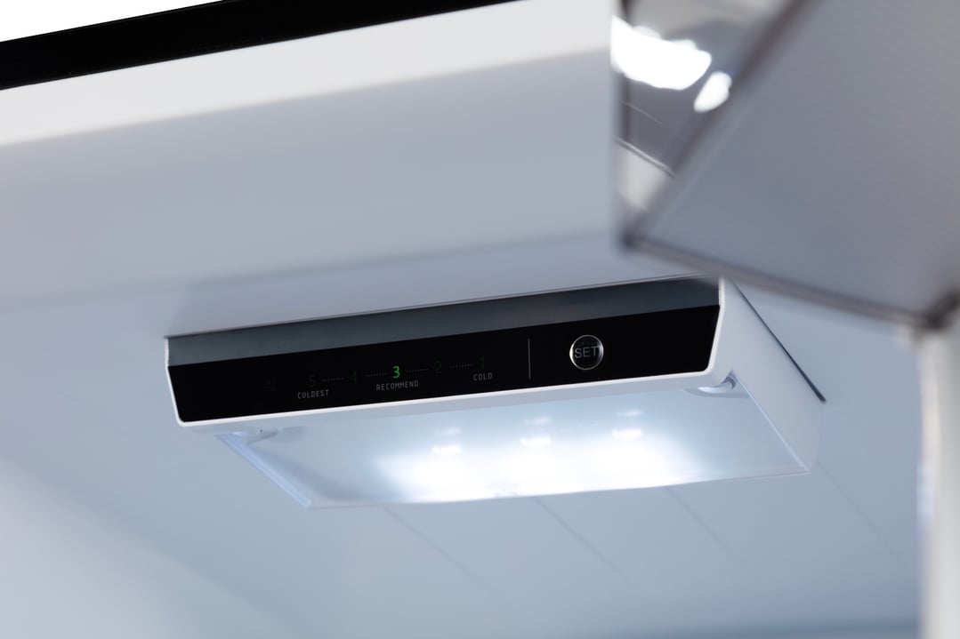 Close up of the interior control panel of a fridge with LED lighting