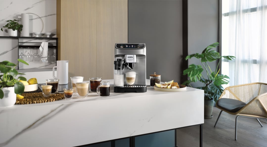 Magnifica Plus Fully Automatic Coffee Machine on a kitchen counter with drinks