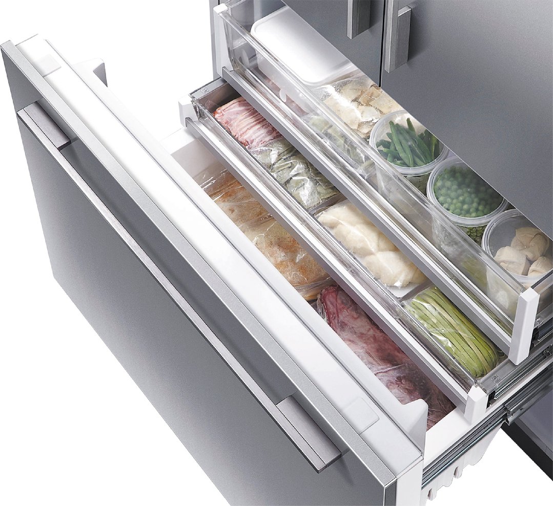 Open freezer drawer of a refrigerator freezer filled with various frozen foods