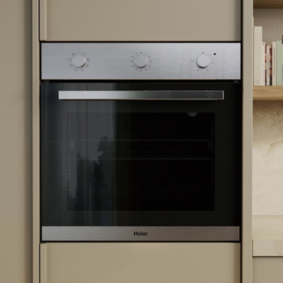 Built-in oven with a stainless steel control panel and black glass door