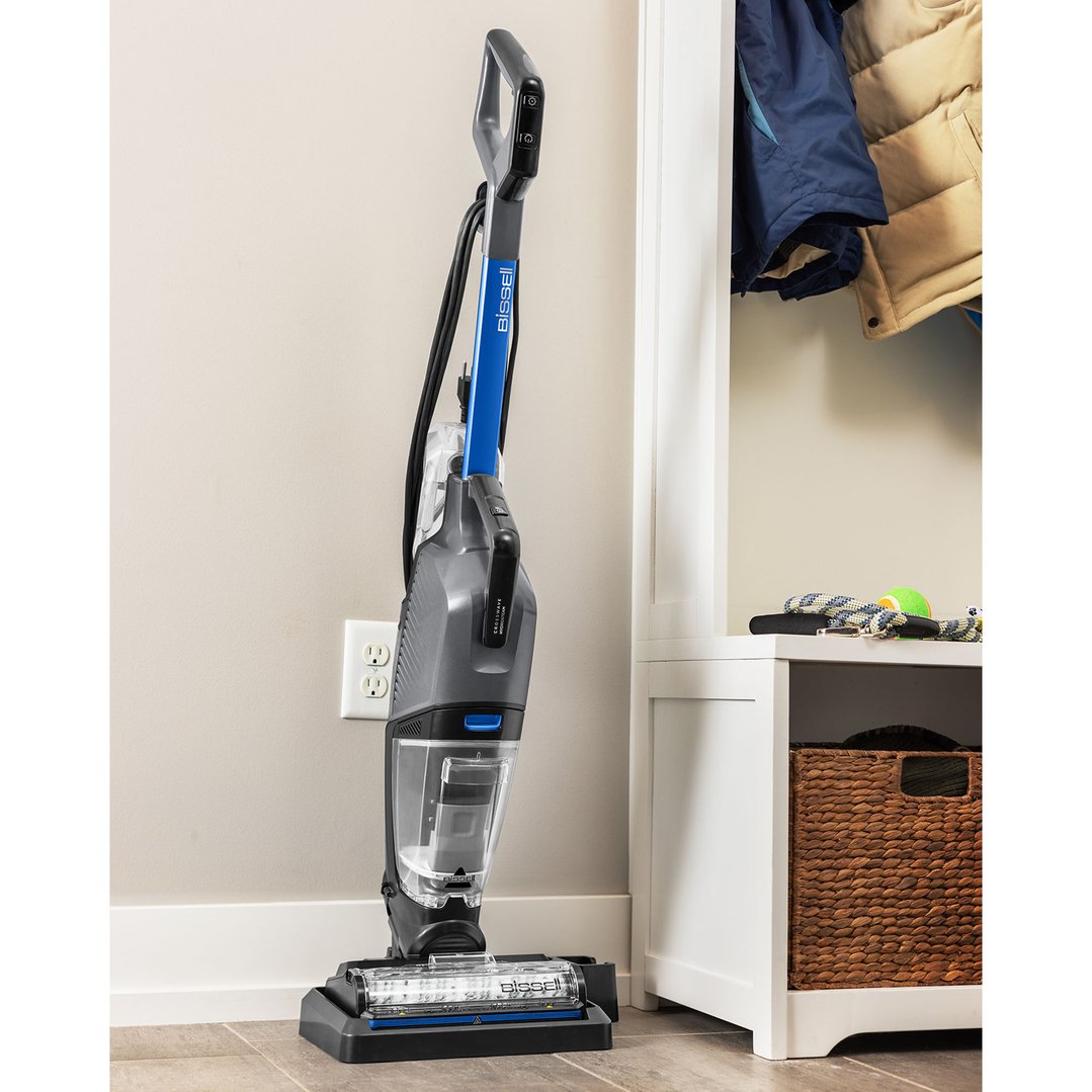 BISSELL CrossWave HydroSteam vacuum cleaner standing on a tiled floor indoors